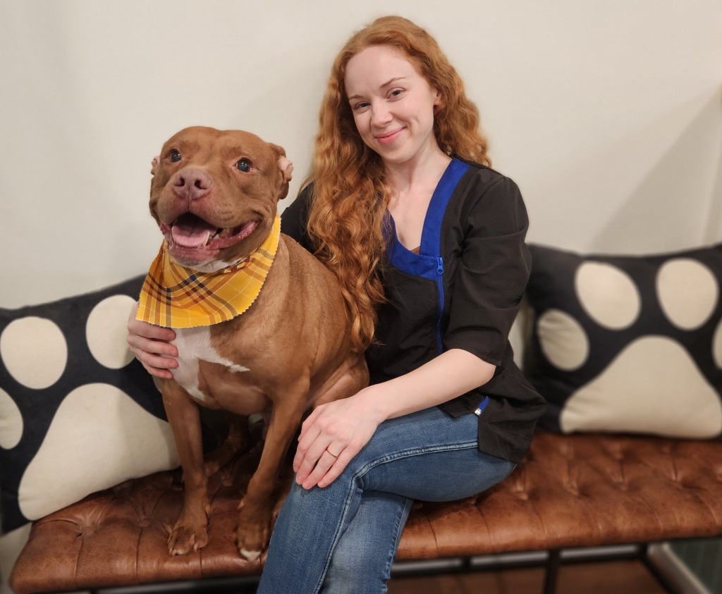 Jessi with a happy dog